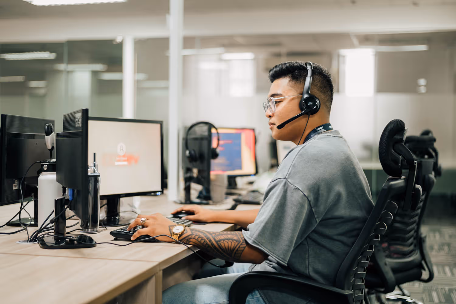 Codev employee with headphones